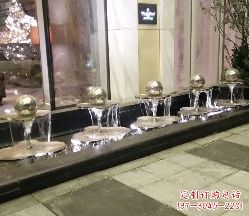 石狮不锈钢小喷泉雕塑——美化环境的艺术