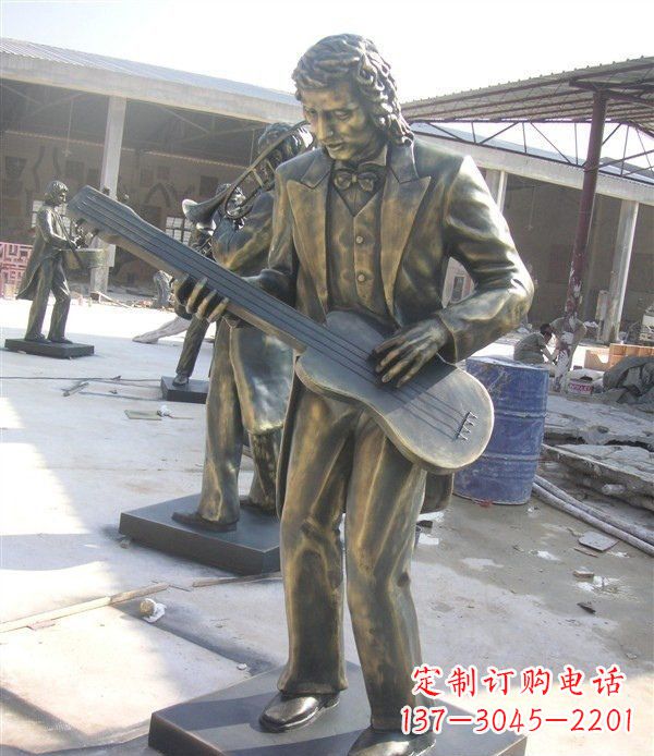 石狮西方人物铜吉他雕塑