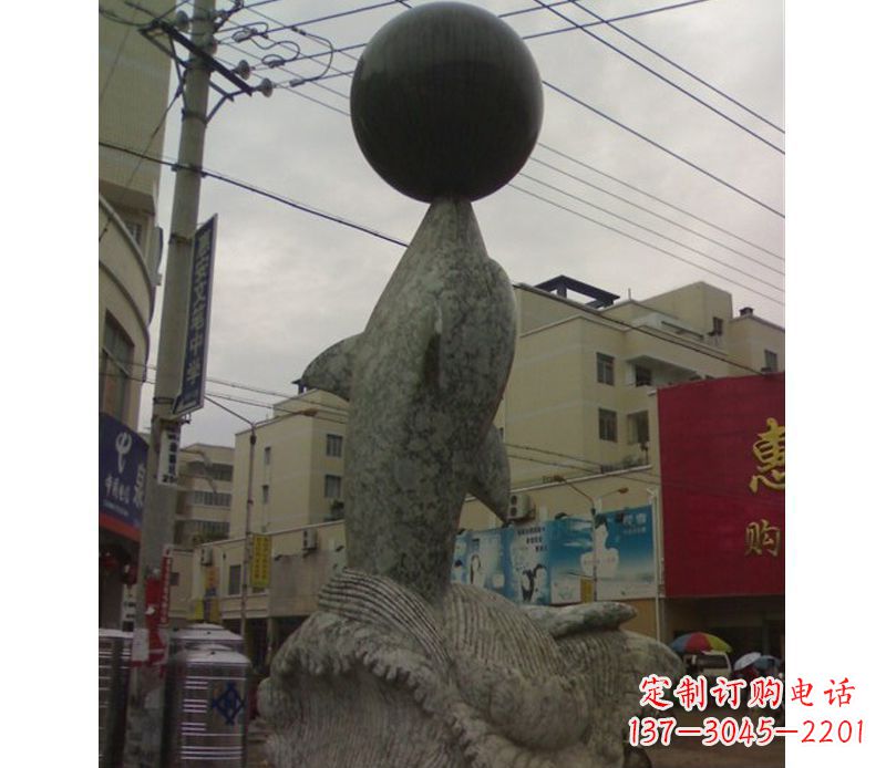 石狮海豚戏球石雕